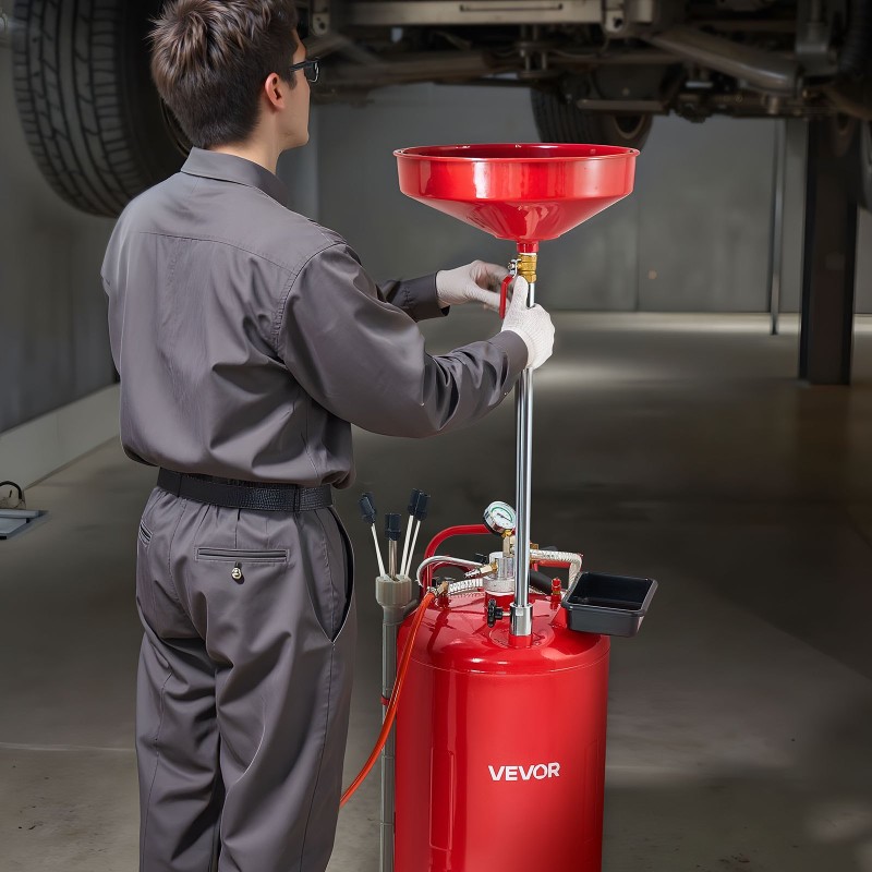 Rautainen 79,5 l jäteöljynkeräyssäiliö pneumaattisella tyhjennyksellä säädettävällä suppilolla ja pyörillä