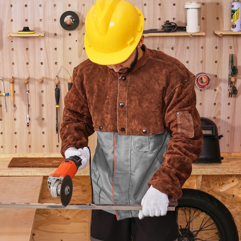 Hitsausviitta lehmännahkainen hihoilla keskikoko ruskea kaksi työkalutaskua