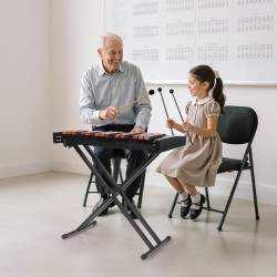 32-sävelinen puukellopeli matalahiiliteräskielillä puukoskettimilla korkeussäädettävä X-jalusta kantolaukku ja neljä kapulaa