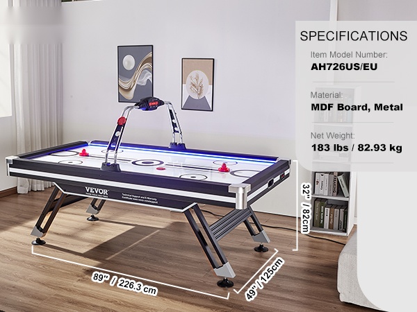 Perheen ja ystävien pelihetki ilmailmakiekkopöydällä